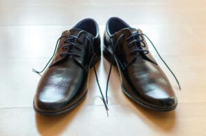 pair of black dress shoes